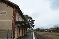 Station platform and historic passenger building.