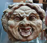 Gorgon antefix, Orvieto, end of the 5th century.  Heads of both Silenus and gorgons were common subjects for antefixes.