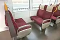 Close-up view of transverse flip-over seating