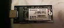 An M.2 2242 SSD connected into a USB 3.0 adapter and connected to a computer