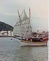 One of the last working bedars 45' (LOD) manoeuvering in port under Topan only, 1980