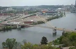 West End Bridge, built from 1930 to 1932, crosses the Ohio River and connects the West End to the Chateau neighborhood in the North Side of the city.